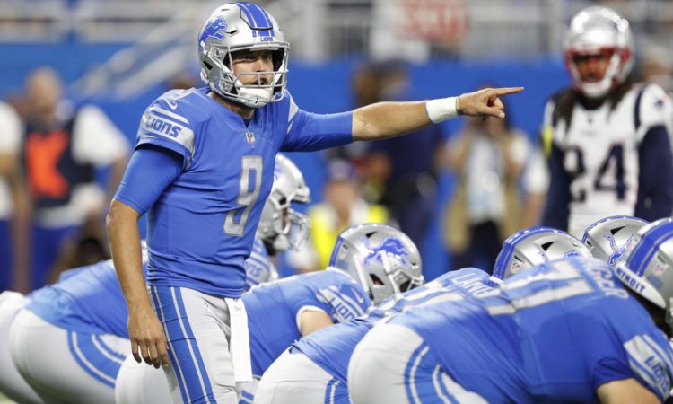 Sep 23, 2018; Detroit, MI, USA; Detroit Lions quarterback Matthew Stafford (9) points and yells out during the first quarter against the New England Patriots at Ford Field. Mandatory Credit: Raj Mehta-USA TODAY Sports